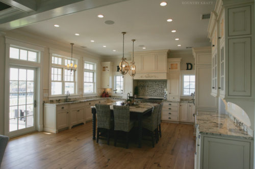 Shaker cabinets, black island with spiral legs, and countertops Old Saybrook, CT