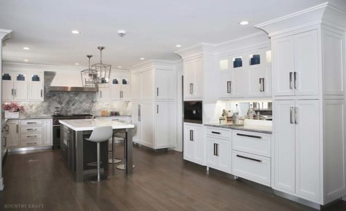 Overall view of white cabinetry in sleek kitchen New Canaan, CT