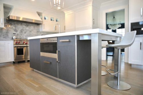 Close up of island with stools in sleek white kitchen New Canaan, CT