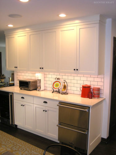 Small kitchen with stainless steel appliances and white cabinets Fairfield, CT