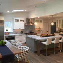 Transitional kitchen with island, table, and stainless steel appliances New Canaan, CT