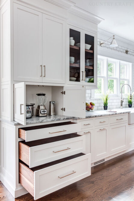 White transitional kitchen with no bead inset cabinets and polished nickel hardware in New Jersey