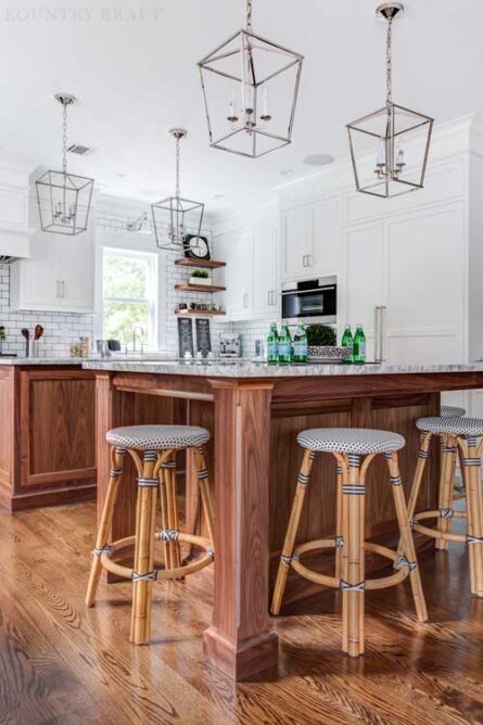 Transitional kitchen with custom alpine white inset perimeter cabinets and two walnut kitchen islands