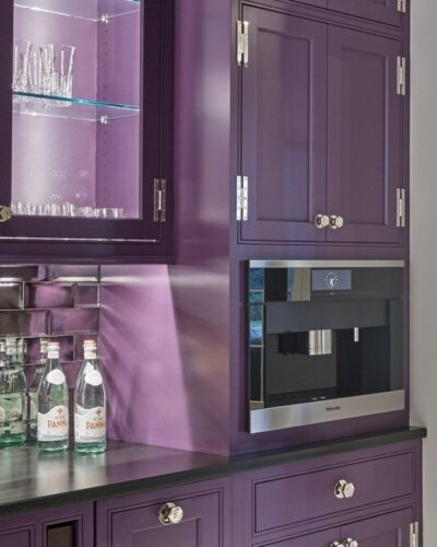 Detail view of Miele built-in coffee maker set within custom Grappa cabinetry in the butler’s pantry.