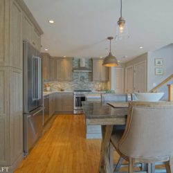 Transitional Kitchen Designed with Weathered Grain Cabinets for a Home in Hampton, New Hampshire