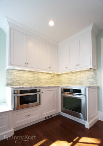 Classic White Cabinets with a microwave drawer and steam oven