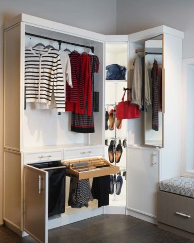 custom closet in white with pull out pant rack