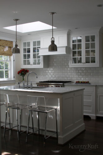 Custom white kitchen cabinets in Bethesda, Maryland with subway tiles