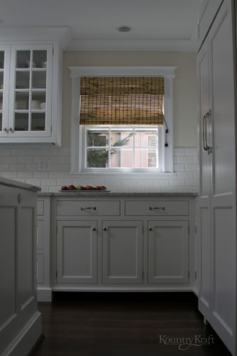 White cabinetry in Bethesda, Maryland by Kountry Kraft