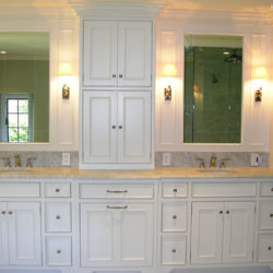 White Bathroom Cabinetry with two sinks create a double vanity for a home in Berwyn, Pennsylvania