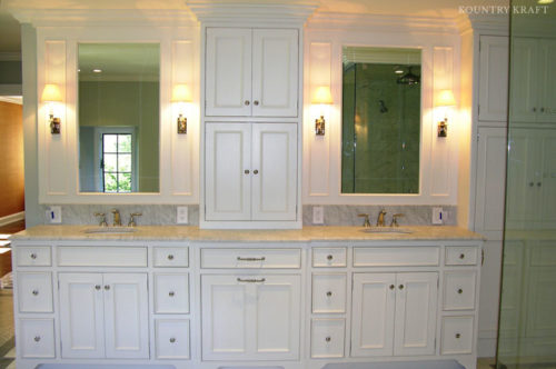 White Bathroom Cabinetry with two sinks create a double vanity for a home in Berwyn, Pennsylvania
