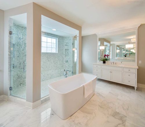 This Master Bathroom Features White Custom Bath Cabinets Crafted In a French Inset Style 