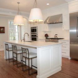 White custom cabinetry and stainless steel refrigerator New Canaan, CT