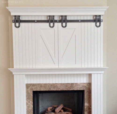 White dove mantel with closed TV cabinet Malvern, PA