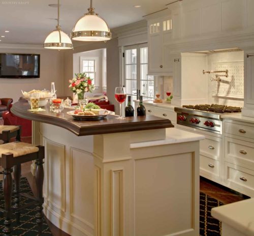 Island with seating, range, white kitchen cabinet, and television Chatham, NJ