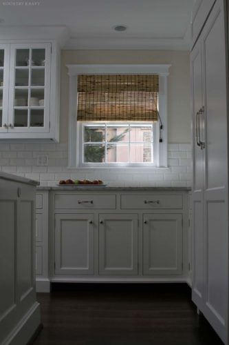 White kitchen cabinets, counter, and window Bethesda, MD