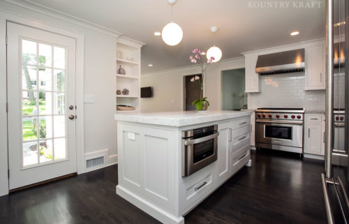 White kitchen cabinets and counter with oven and range Summit, NJ