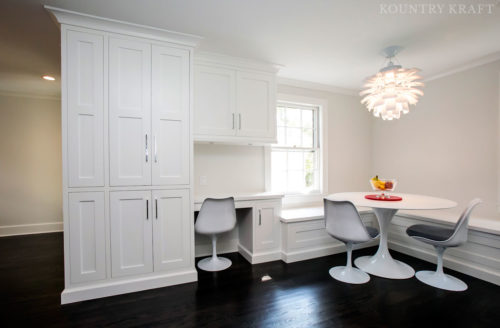 Hard Maple wood white pantry with built in desk and corner seating area Summit, NJ