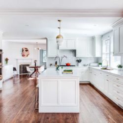 White kitchen with island, counters, ovens, and cabinets Short Hills, NJ