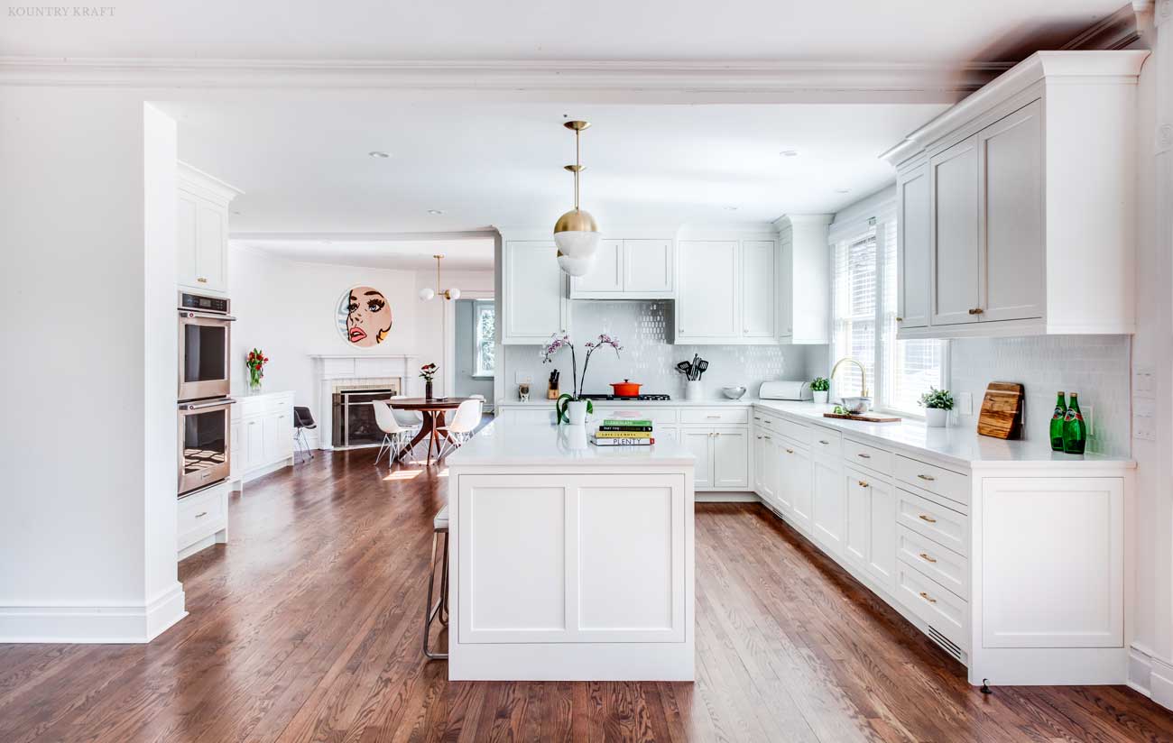 White kitchen with island, counters, ovens, and cabinets Short Hills, NJ