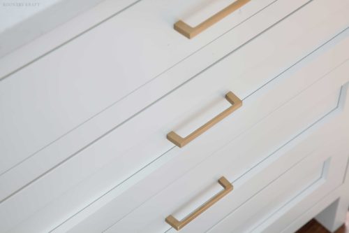 Close up view of white drawers with gold handles Short Hills, NJ