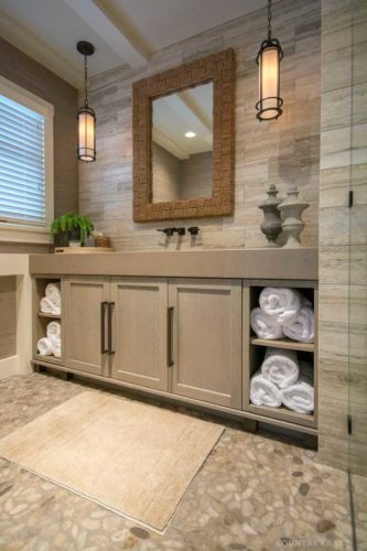 Bathroom with white oak bathroom cabinets, towels, and mirror Lake Winnipesauke, NH