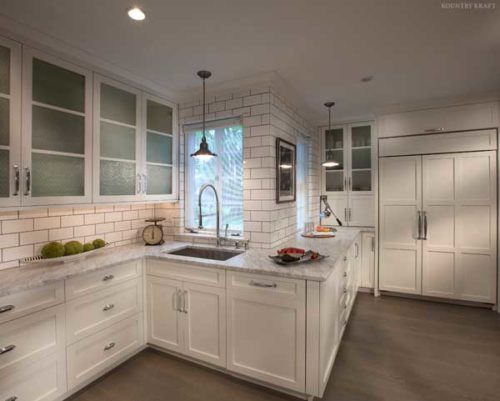 White storage cabinets, counter, and sink Bryn Mawr, PA