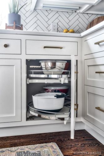 Effective Storage Solution Cabinetry is a Current Kitchen Trend Featured in this Kitchen